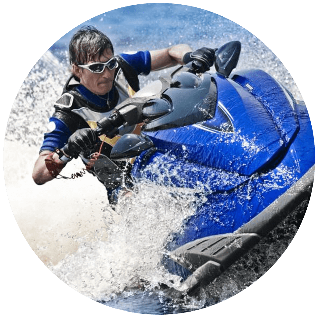 man on blue jetski in water