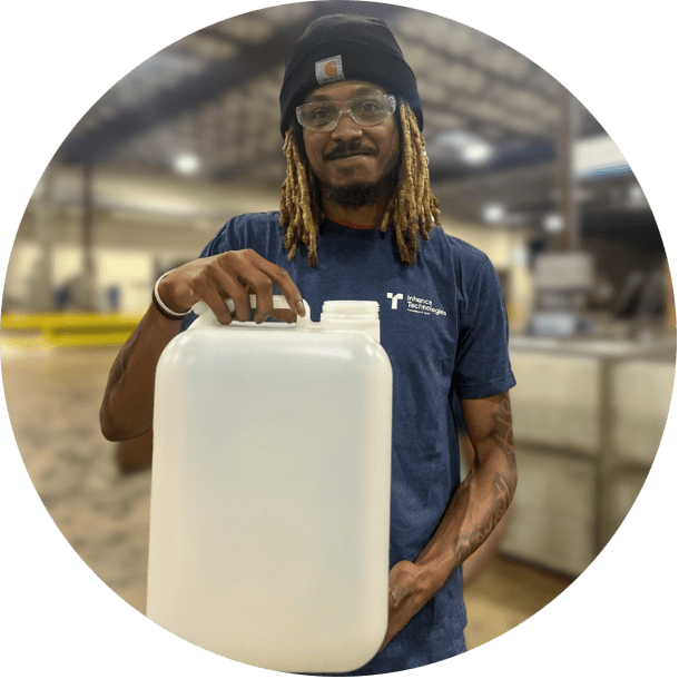 man holding plastic jug